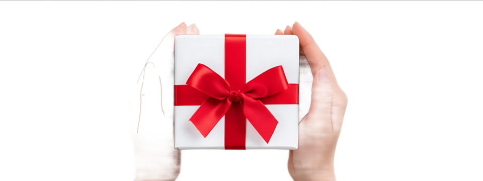 Hands holding a gift box with a red ribbon bow isolated on a white background top view The white present is for a holiday or birthday celebration Concept of