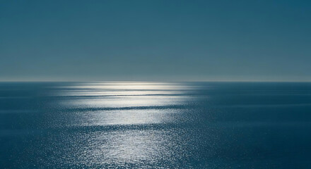 Obraz premium A serene view of the ocean with sunlight reflecting off the water creating a shimmering effect on the surface ai generated