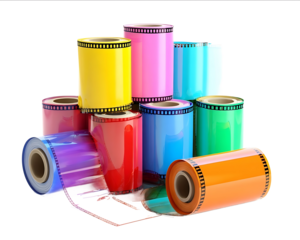 Colorful film rolls and photographic film on a white background isolated
