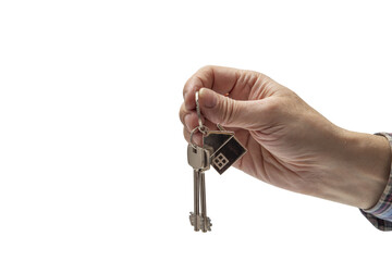 Hand of man in a checkered shirt holding keys on isolated background. Concept of sale of real estate, rent of housing