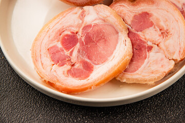 Ham hock with skin jambonneau cooked pork knuckle with rind tasty snack fresh delicious gourmet food background on the table rustic top view copy space