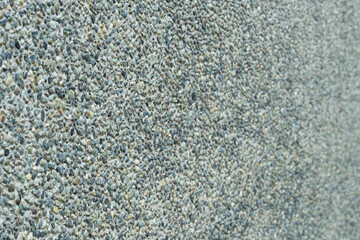 小石とコンクリートの壁面。背景・テクスチャ素材