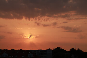 small clouds hid the sun, creating an extremely beautiful orange light