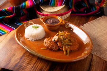 Tortitas de Carne, Meat pancakes. Popular recipe in Mexico and Latin America, Tortitas are similar to cutlets, shredded meat, beef, tuna, chicken or other ingredient, bathed in beaten egg and fried.