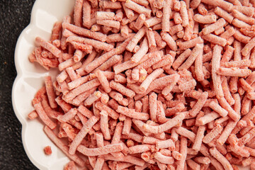 Minced meat frozen ground meat frozen pork, beef or chicken tasty snack fresh delicious gourmet food background on the table rustic food top view copy space