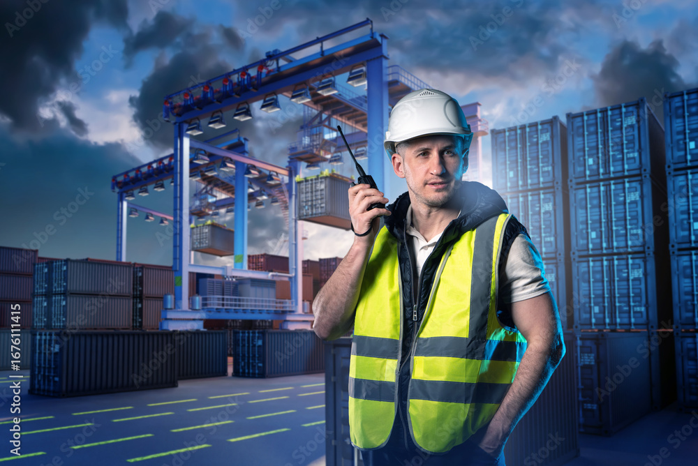 Poster man with walkie-talkie in container port. security guard of evening logistics terminal. man from sec