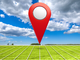 Suburban area with green lawn. Large geotag over summer field. Area for creating agribusiness....