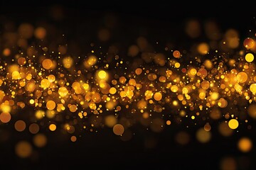 Abstract golden sparkles on a black background