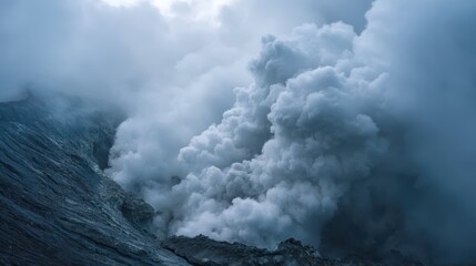 Majestic Volcano Venting Steam and Ash Under Dramatic Cloud Cover