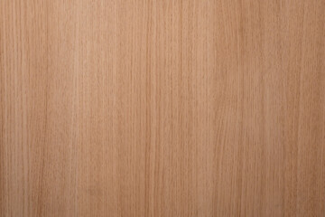 Naklejka premium Close-up of a natural wooden surface showcasing fine grain patterns and warm tones