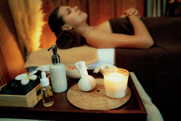 Aromatherapy massage ambiance or spa salon composition setup with focus decor candles and spa...