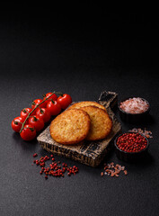 Hash browns, fried potato and onion pancakes with spices for breakfast. Fried hash browns