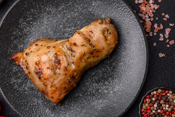 Chicken leg, quarter grilled with spices and rosemary. Chicken leg