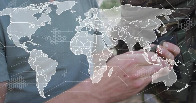 Instructor threading paracord onto pack strap in training as world map overlay gaining hex data
