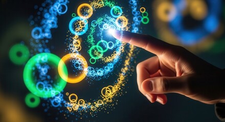 A hand touches a glowing interface with colorful circular elements in a dark futuristic setting