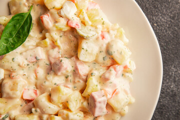 Potato salad ham, potato, tomato, carrot, mayonnaise tasty snack fresh delicious gourmet food background on the table rustic top view copy space