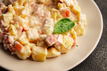 Potato salad ham, potato, tomato, carrot, mayonnaise tasty snack fresh delicious gourmet food background on the table rustic top view copy space