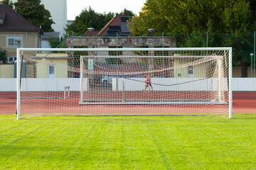 Empty soccer goal on a sports field