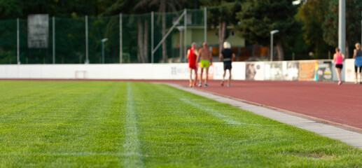 Track field with runners