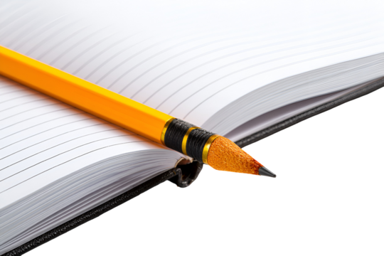 Yellow pencil on open notebook ready to write