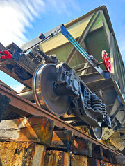 Cargo freight train , close-up, blue sky