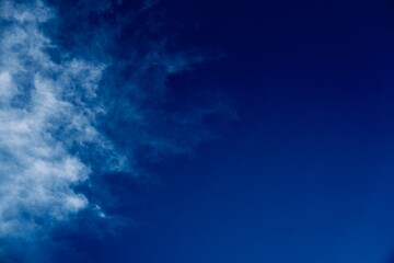 Towering Masses with Blue Open Sky