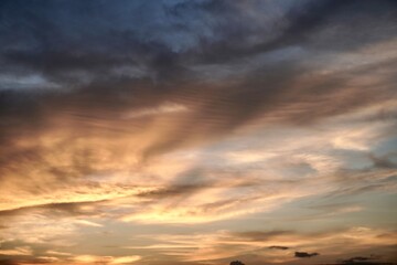 Golden Sunset Over Heavy Clouds