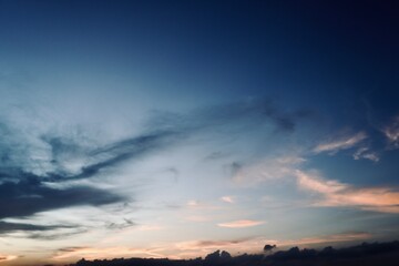 Dark Clouds Over Vibrant Evening Horizon