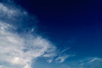 Majestic White Clouds Against Blue Gradient