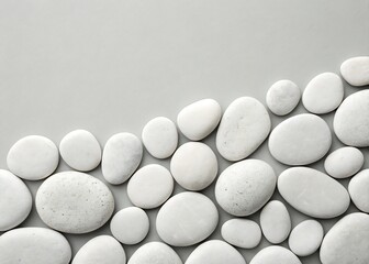 White Pebbles Arranged on Minimal Flat Neutral Background