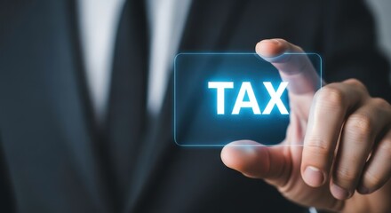 A hand holding a transparent screen displaying the word tax in bright blue letters
