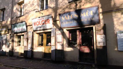 Kraków, Poland. Szeroka street, is disguised to look like a row of early 20th century trade shops and is decorated with relating to the area's Jewish heritage, in Kazimierz.