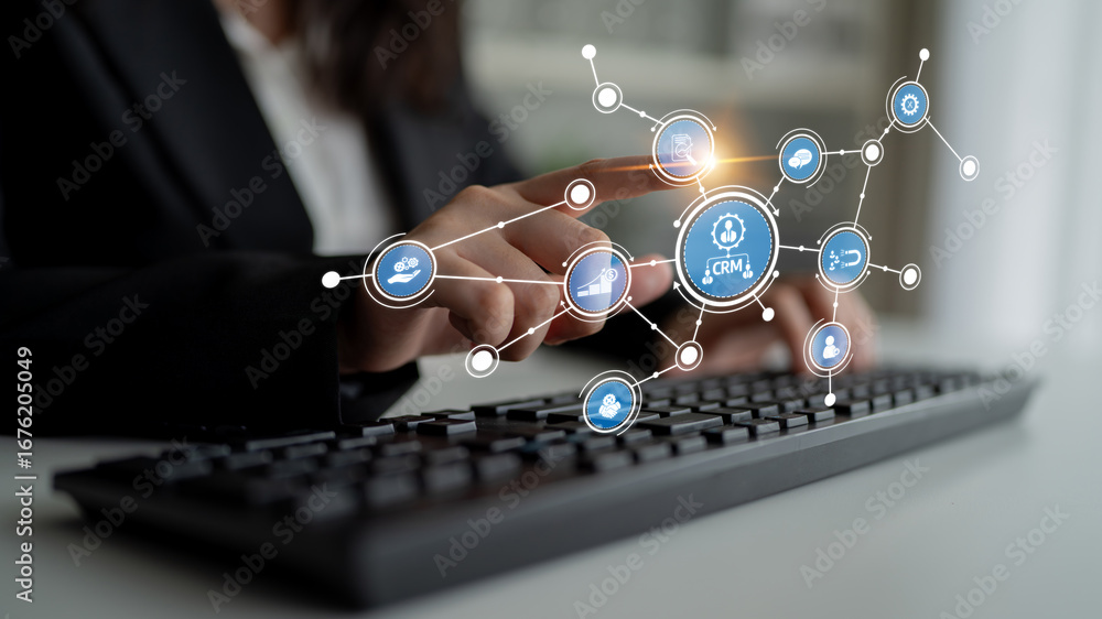 Aufkleber business professional engages with an innovative crm interface on a computer keyboard, showcasing th