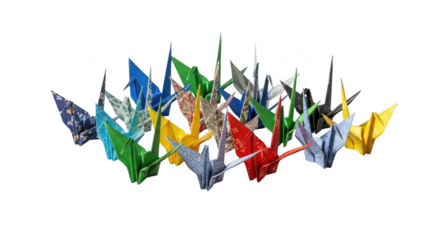 A vibrant collection of colorful origami cranes suspended against a deep black background
