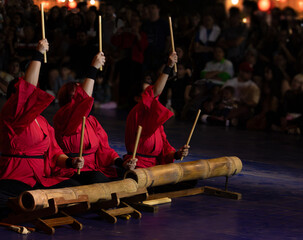 Red musicians in Kumi-daiko performance