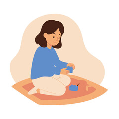 Cheerful young woman playing with blue building blocks sitting crosslegged on a mat flat vector art.