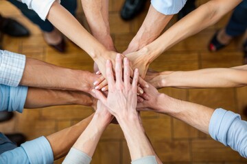 Concept of teamwork and cooperation - hands of business people in a scrum. Colleagues together, team building, business project.