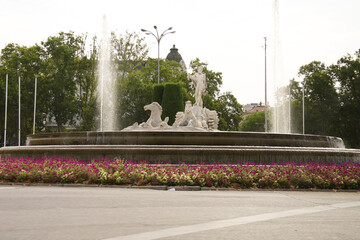 The Fountain of Neptune at Canovas del Castillo Square in Madrid city © SoniaBonet