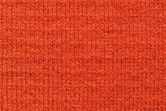 Red wool jersey fabric texture as background