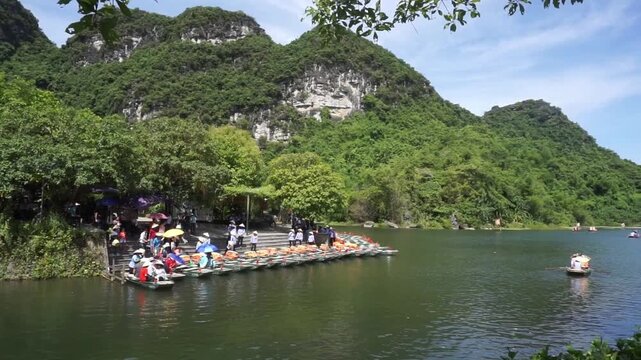 Boating on river into heritage sites, Trang An Scenic Landscape Complex, Ninh Binh Province, Vietnam Travel