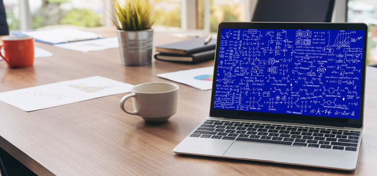 Mathematic equations and modish formula on computer screen showing concept of science and education
