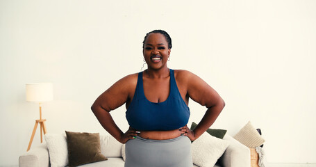 Confident plus size African American woman smiles widely