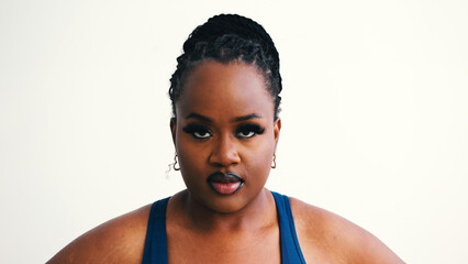 Confident plus size African American woman smiles widely