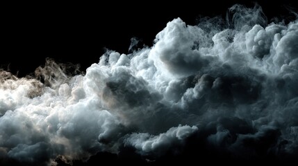 Dramatic formation of billowing clouds illuminated by soft light against a dark background at twilight