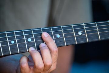 The art of playing music on an acoustic guitar The Passion of a Musician