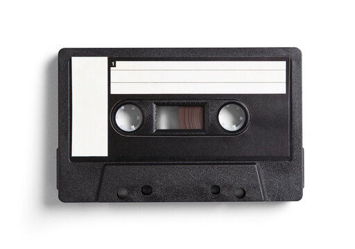 An optically captured, isolated, realistic black 80s cassette tape with a soft dark shadow.