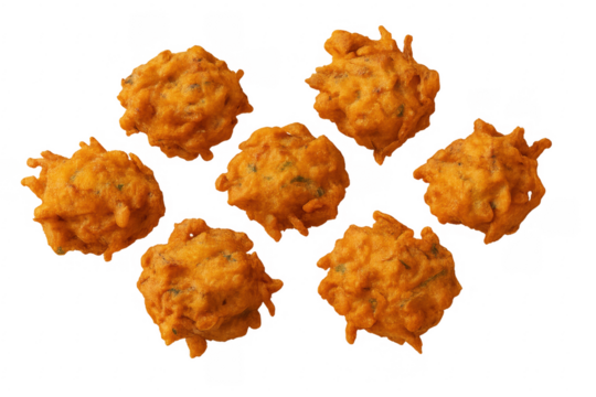 Seven crispy pakora floating on transparent background