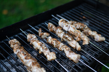 Traditional shashlik cooking on a grill