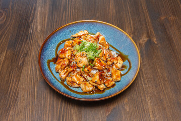 Oyster Sauce Chicken: Tender strips of chicken thigh sautéed with tricolor peppers and the umami sauce that defines Cantonese cuisine