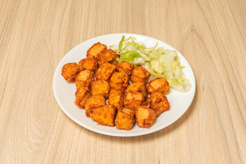 Chicken nuggets with a double layer of breading, ensuring maximum crunch when you bite into them